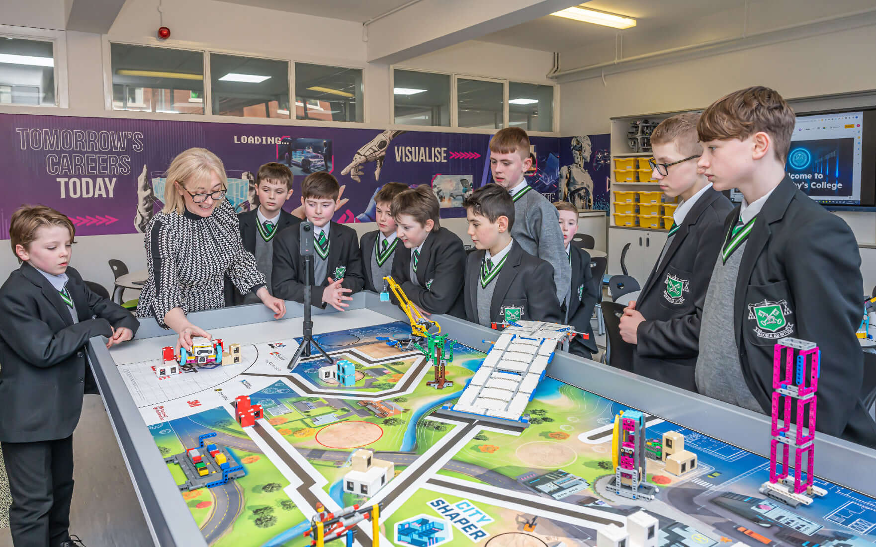 Students engaging in a digital creative hub activity at St Malachy's College, collaborating on innovative projects.