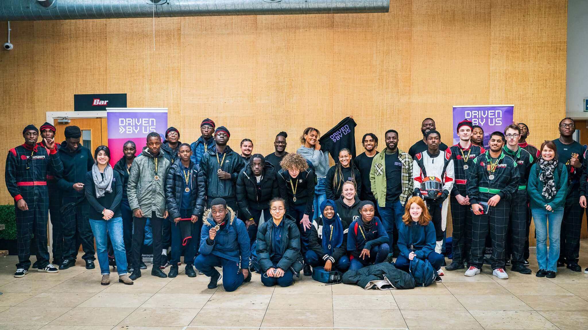 Group photo of diverse individuals at an event, showcasing community engagement and collaboration.