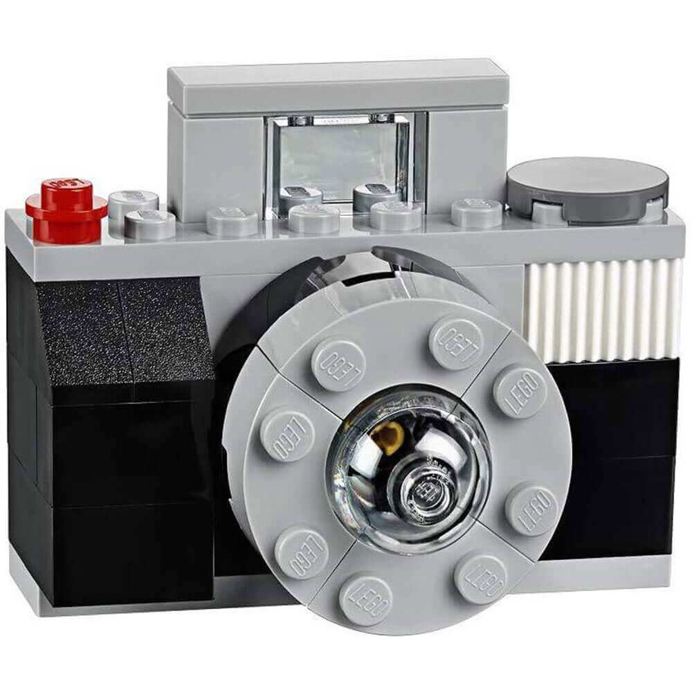 LEGO camera model built from colorful bricks, featuring detailed lens and design for creative building fun.