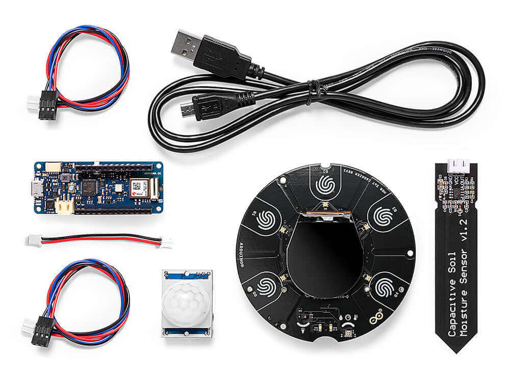 Arduino IoT kit components including sensors, cables, and connectors for building Internet of Things projects.