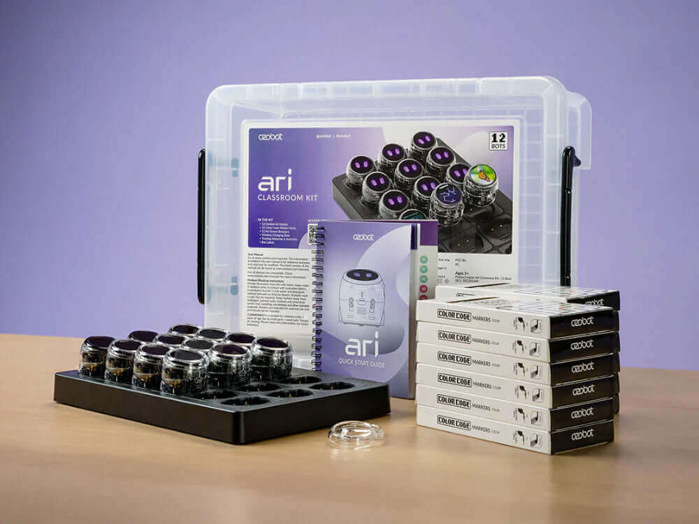 Ari Classroom Kit by Adafruit, featuring vials, instruction manual, and packaging on a table.