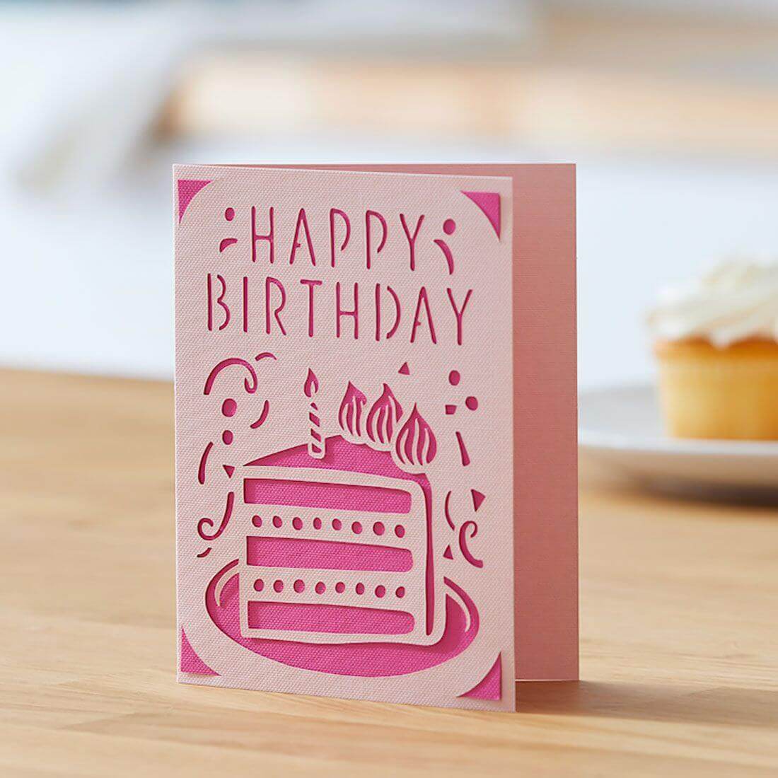 Happy Birthday card design featuring a layered cake in pink and white, perfect for Cricut Joy insert cards.