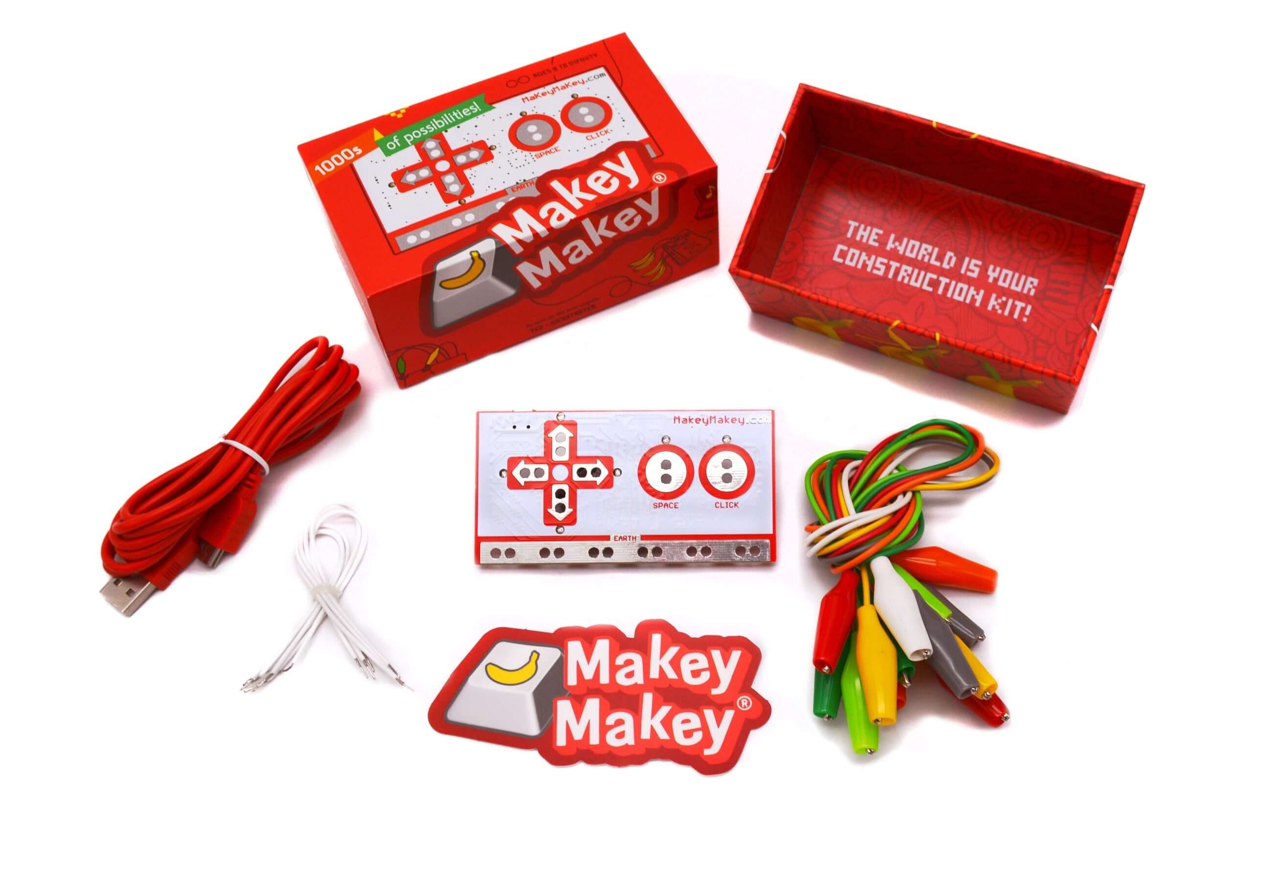 Makey Makey® Classic Invention Literacy Kit with controller board, cables, and accessory items.