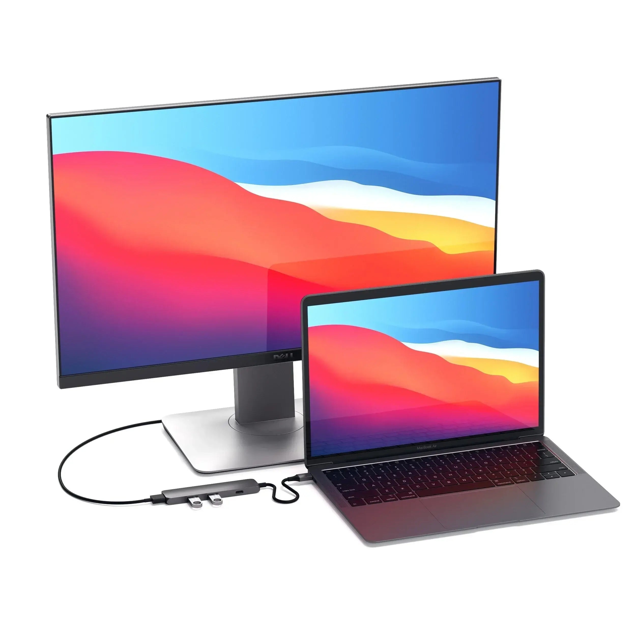 Satechi Type-C Slim Multi-Port Adapter connecting a MacBook to an external monitor with 4K display.