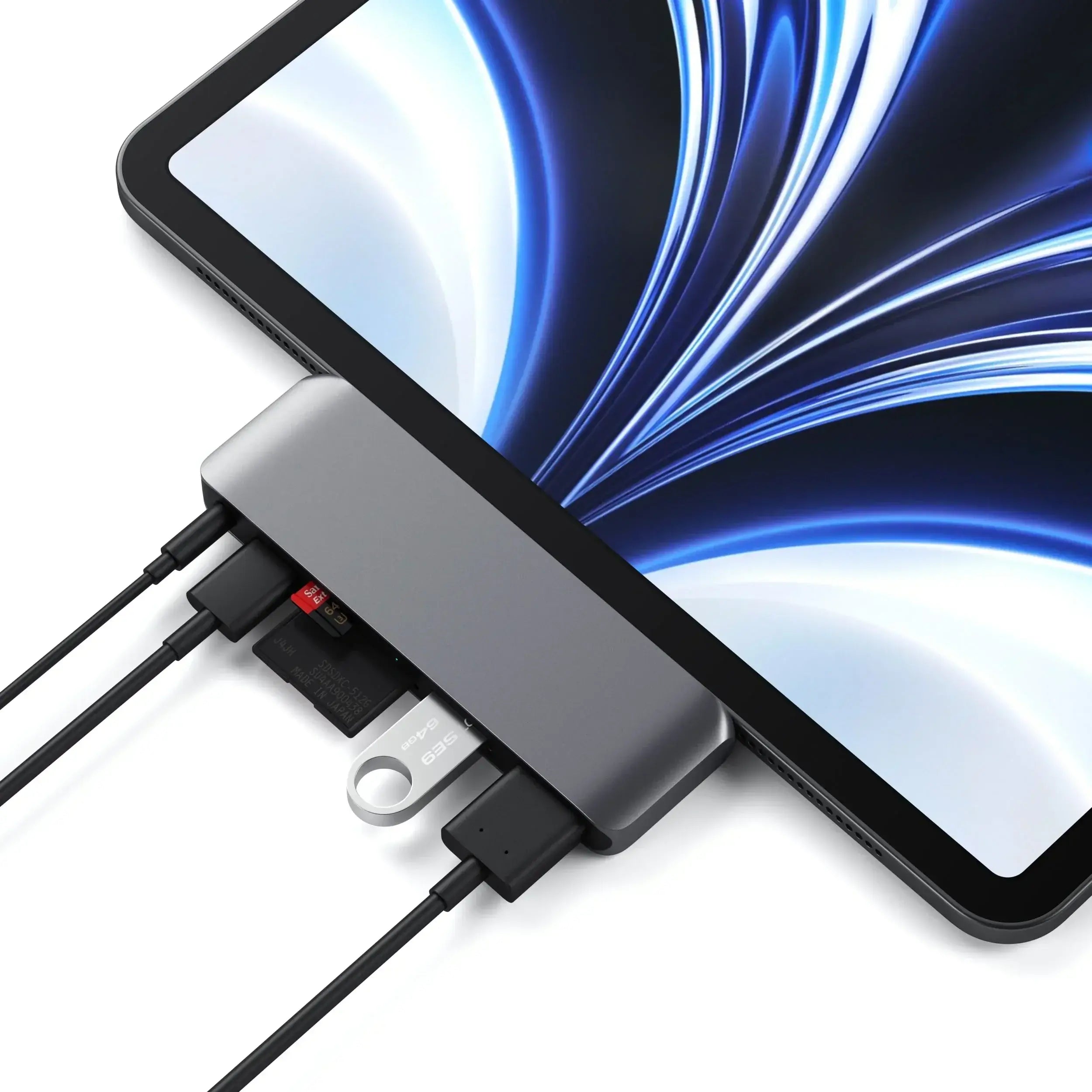 Satechi USB-C Mobile Pro Hub attached to iPad, showcasing SD card reader and multiple ports for connections.