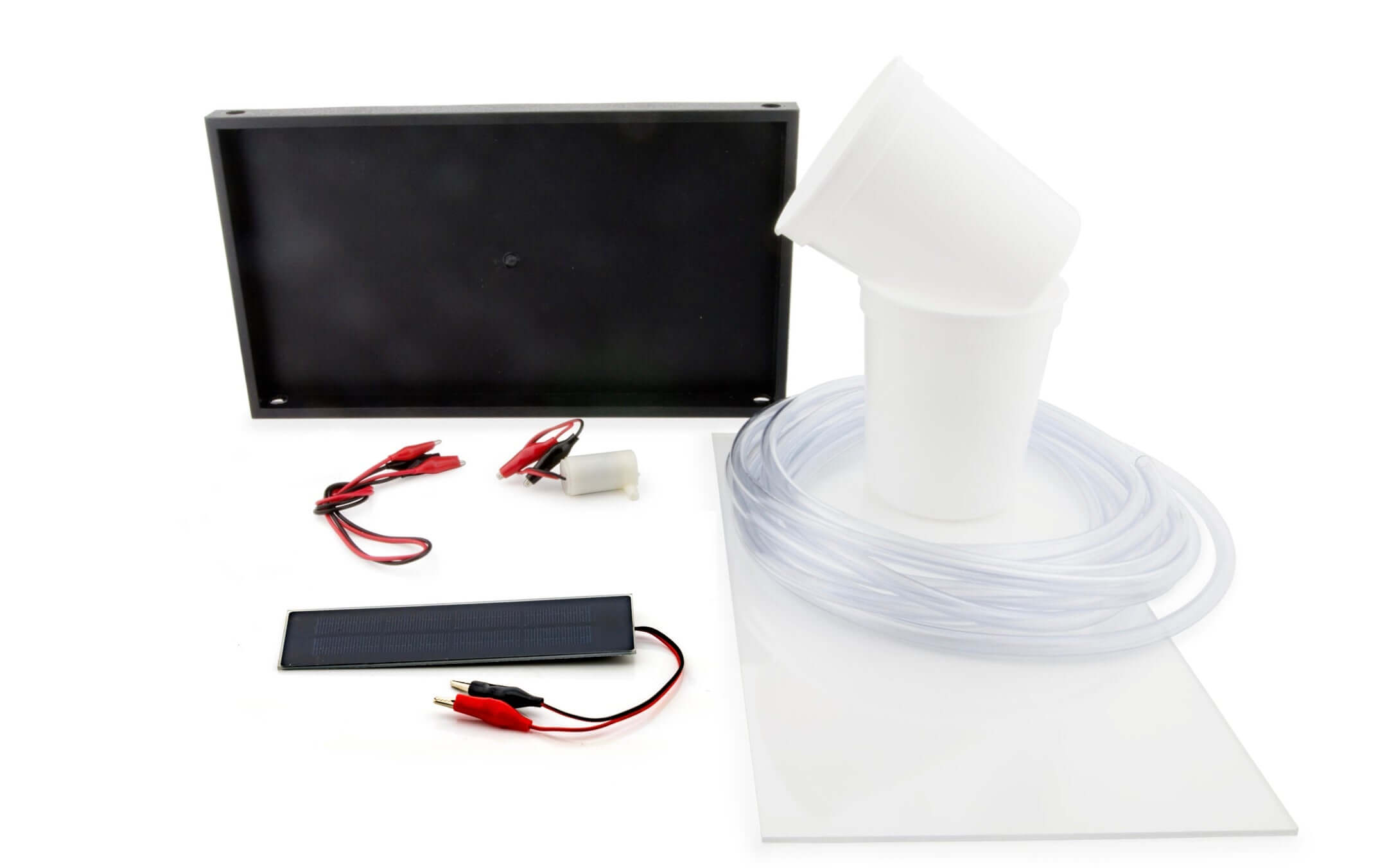 Solar Thermal Exploration Kit components including solar panel, tubes, cups, and connectors for learning about water heating systems.