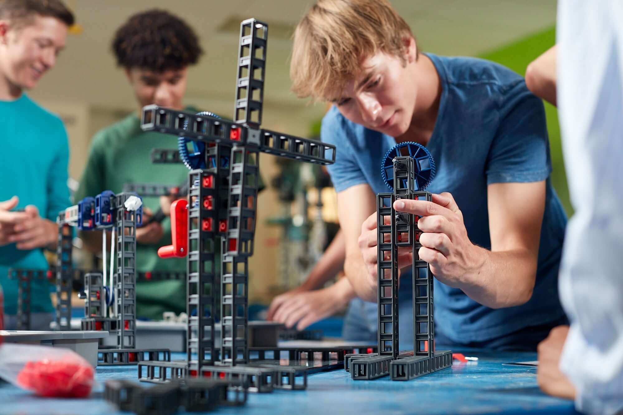 Students engaging with the Sphero Blueprint Build Kit, constructing engineering prototypes in a classroom setting.