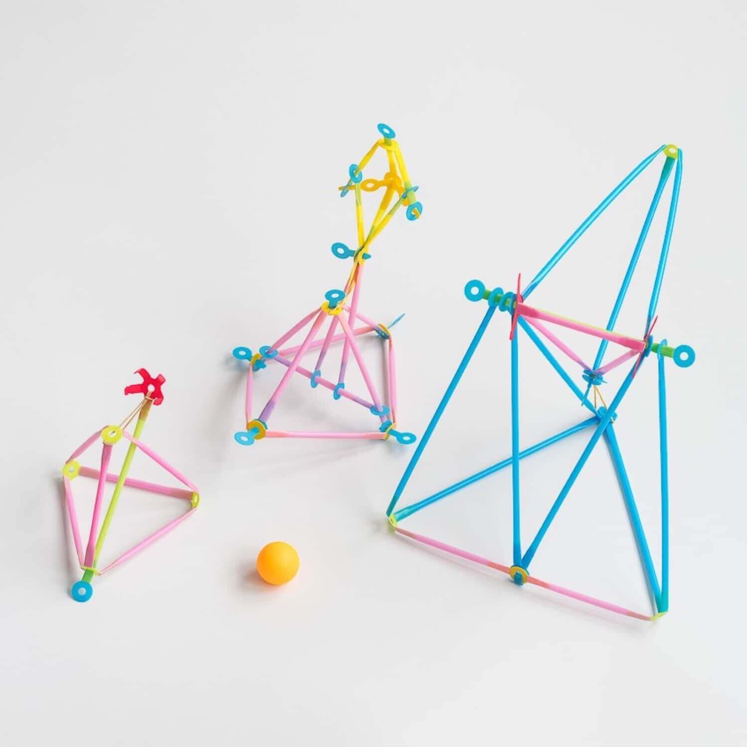 Colorful Strawbees structures made with construction straws and connectors, ideal for STEAM learning and robotics projects.