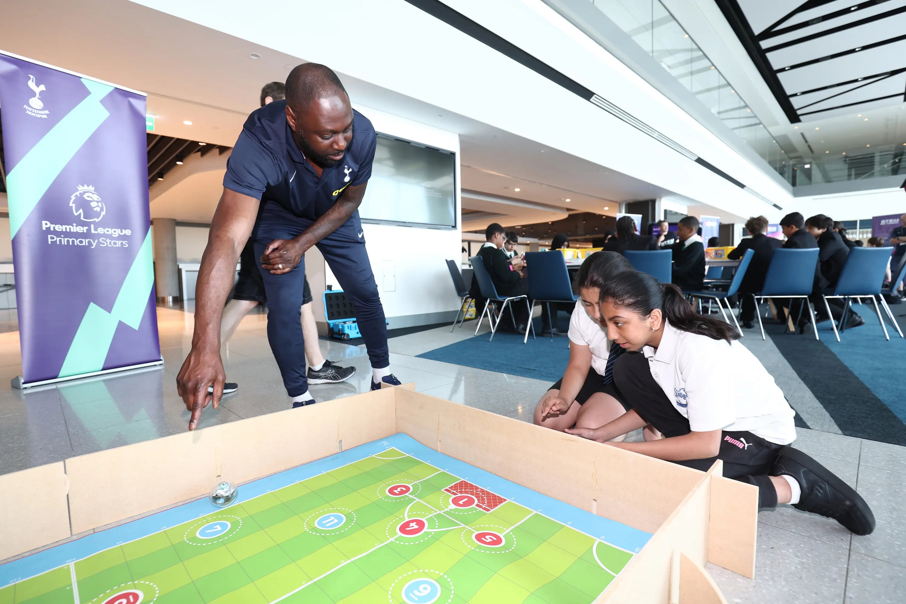 The Tottenham Hotspur Foundation and Schneider Electric work together to get young people from different backgrounds to get involved in STEM and motorsports.