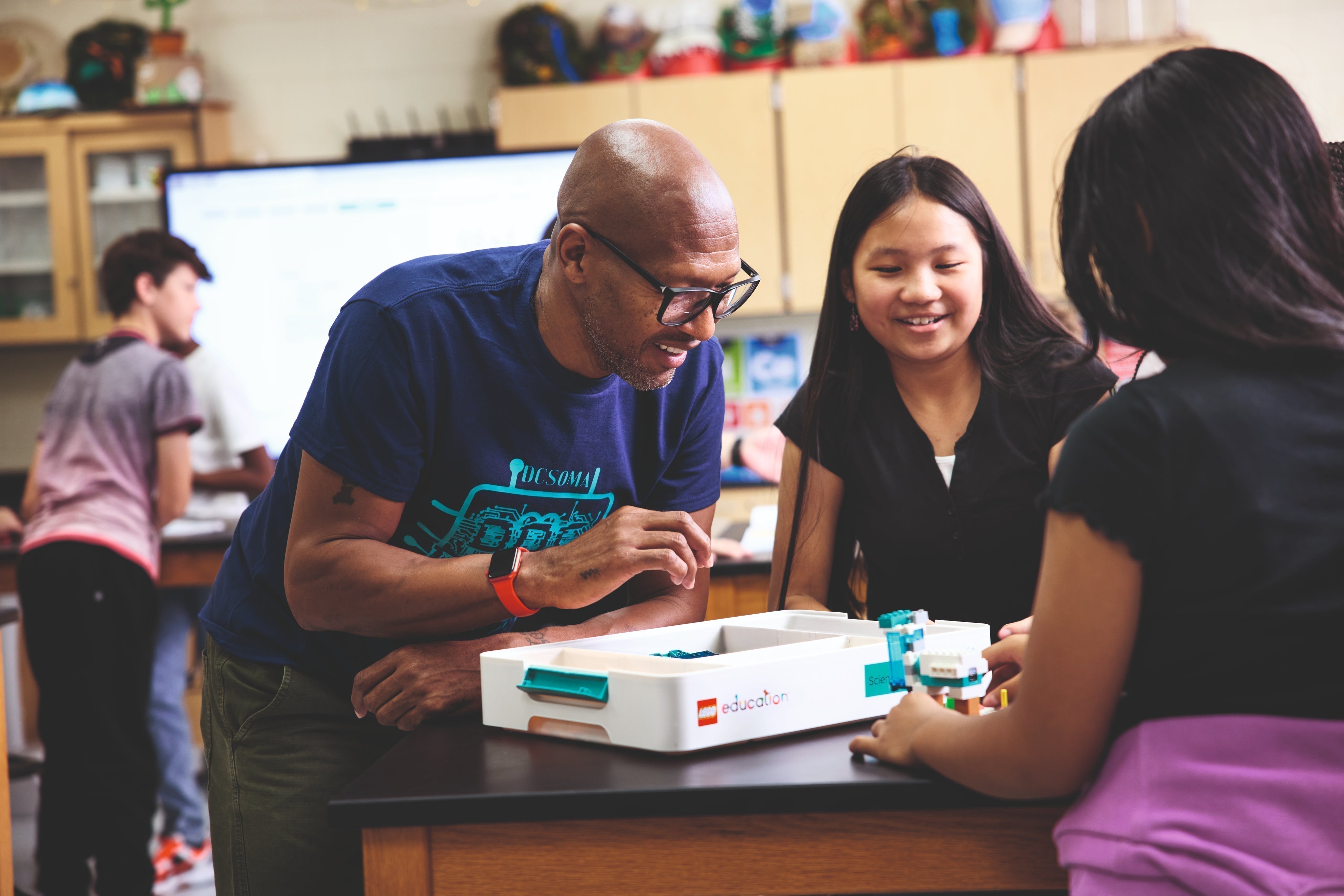 Practical Science Made Easy with the NEW LEGO® Education Science Sets - teachers engaging with students in a classroom.