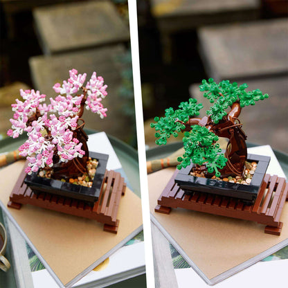 LEGO® Bonsai Tree Building Set 10281 featuring interchangeable pink cherry blossoms and green leaves.