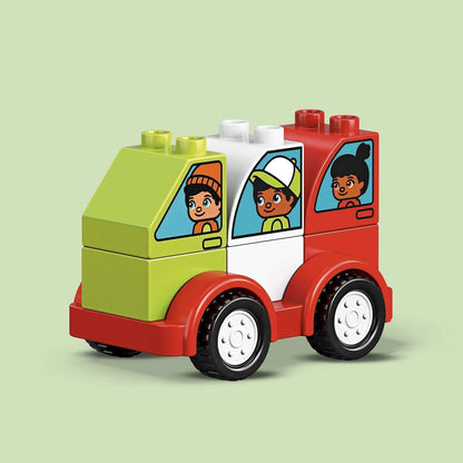 Colorful LEGO® DUPLO My First Car with children inside, perfect for toddlers' imaginative play and creativity.