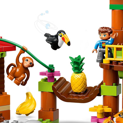 LEGO® DUPLO Town Tropical Island Set 10906 with a monkey, toucan, and tree house, promoting preschooler play and imagination.