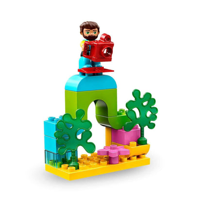 LEGO DUPLO Town Submarine Adventure bath toy with colorful blocks and a child holding a red submersible.