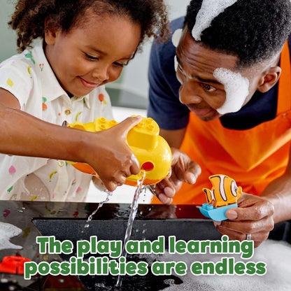Child and adult enjoying LEGO® DUPLO Submarine Adventure bath toy; learning and fun during playtime.