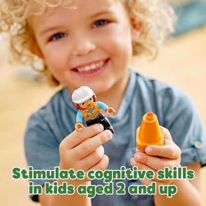 Child playing with LEGO DUPLO character and traffic cone, promoting cognitive skills development for ages 2 and up.