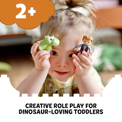 Toddler engaging in creative role play with LEGO® DUPLO dinosaur toy, perfect for dinosaur-loving kids aged 2 and up.