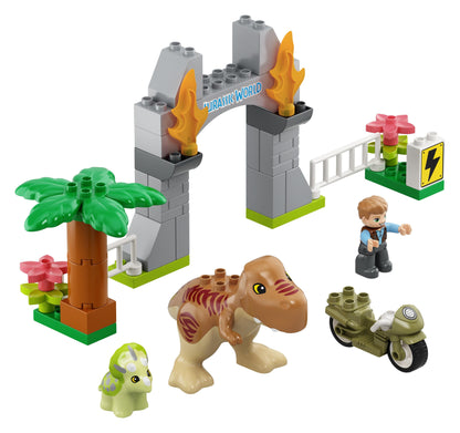 LEGO® DUPLO Jurassic World T. rex and Triceratops set with trees, flowers, and a biker figure for imaginative play.
