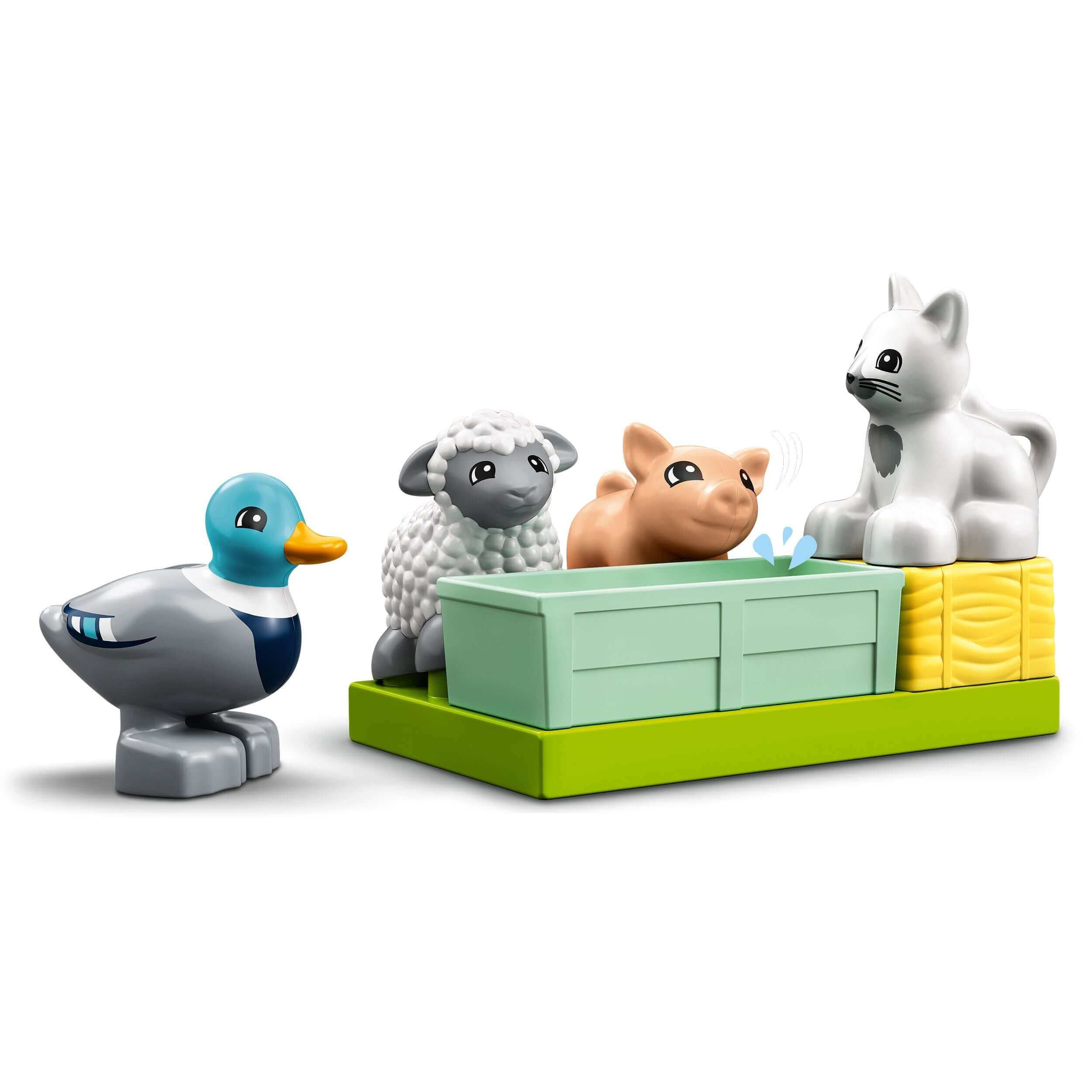 LEGO DUPLO Town Farm Animal Care toys featuring a duck, sheep, pig, and cat for imaginative play.