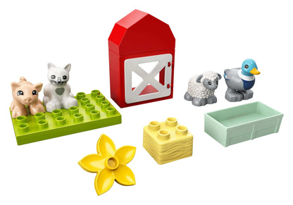 LEGO DUPLO Town Farm Animal Care set featuring pig, sheep, duck, cat, barn, and accessories for toddlers.