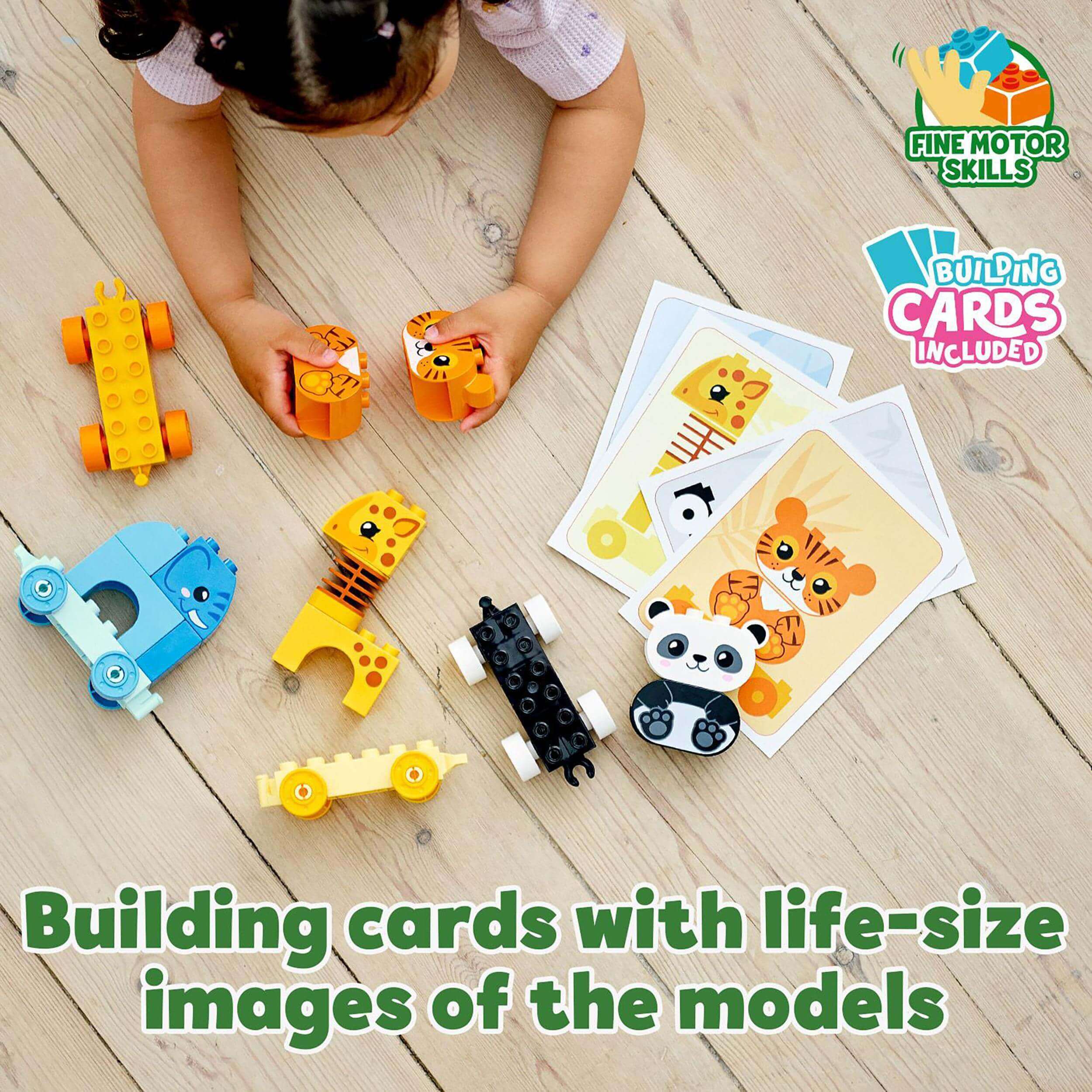 Child playing with LEGO® DUPLO Animal Train, featuring colorful building cards and animal models on the floor.