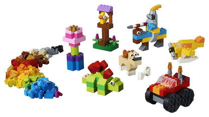 Colorful LEGO® Classic Basic Brick Set creations including animals, plants, and a vehicle for creative building.