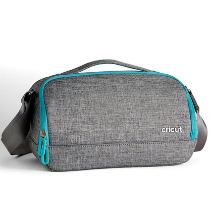 Cricut Joy™ Tote bag in grey with teal accents, designed for easy transport and organization of your crafting tools.