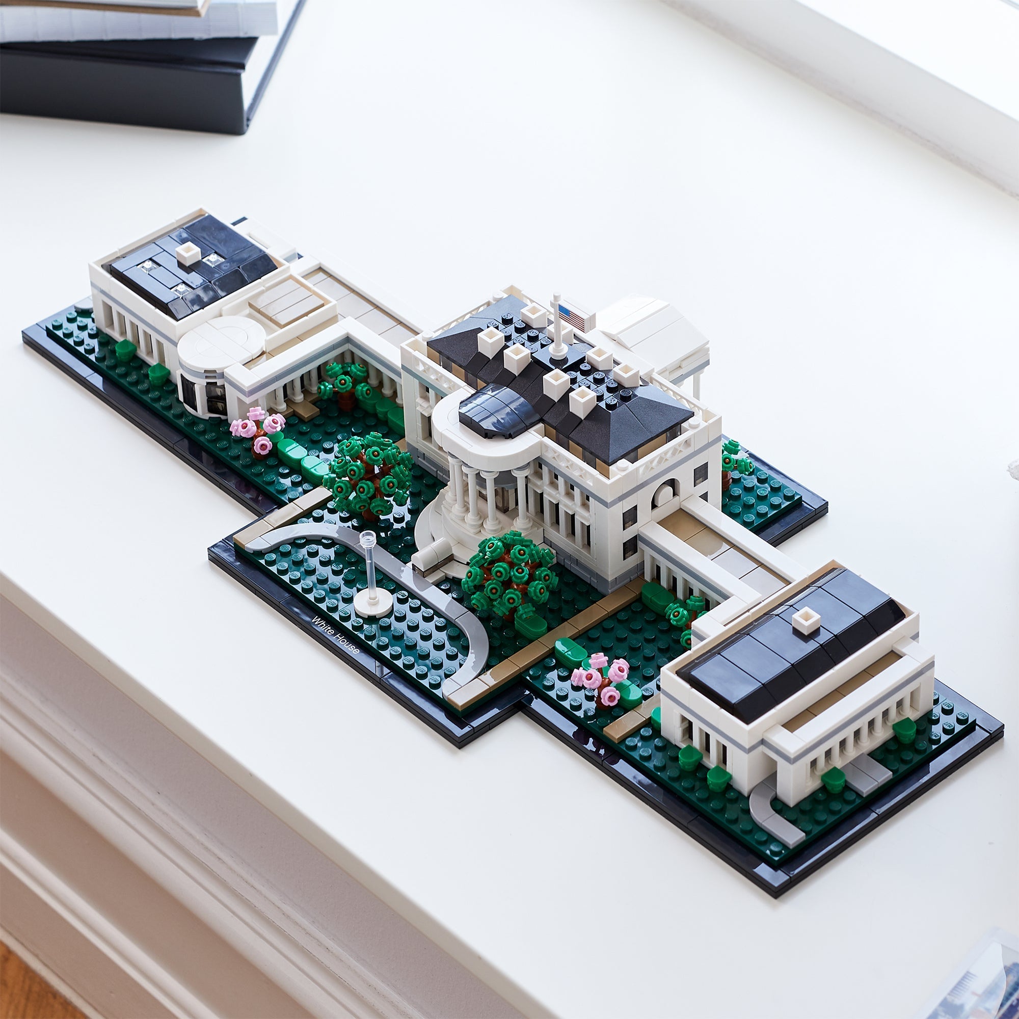 LEGO Architecture The White House Building Set 21054 displayed on a table with intricate landscaping details.