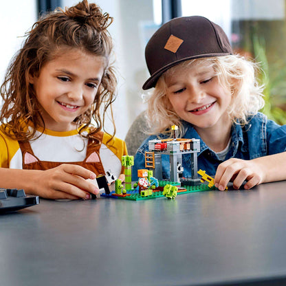 Kids enjoying hands-on play with LEGO® Minecraft The Panda Nursery Building Set 21158, featuring cute pandas and playful action.