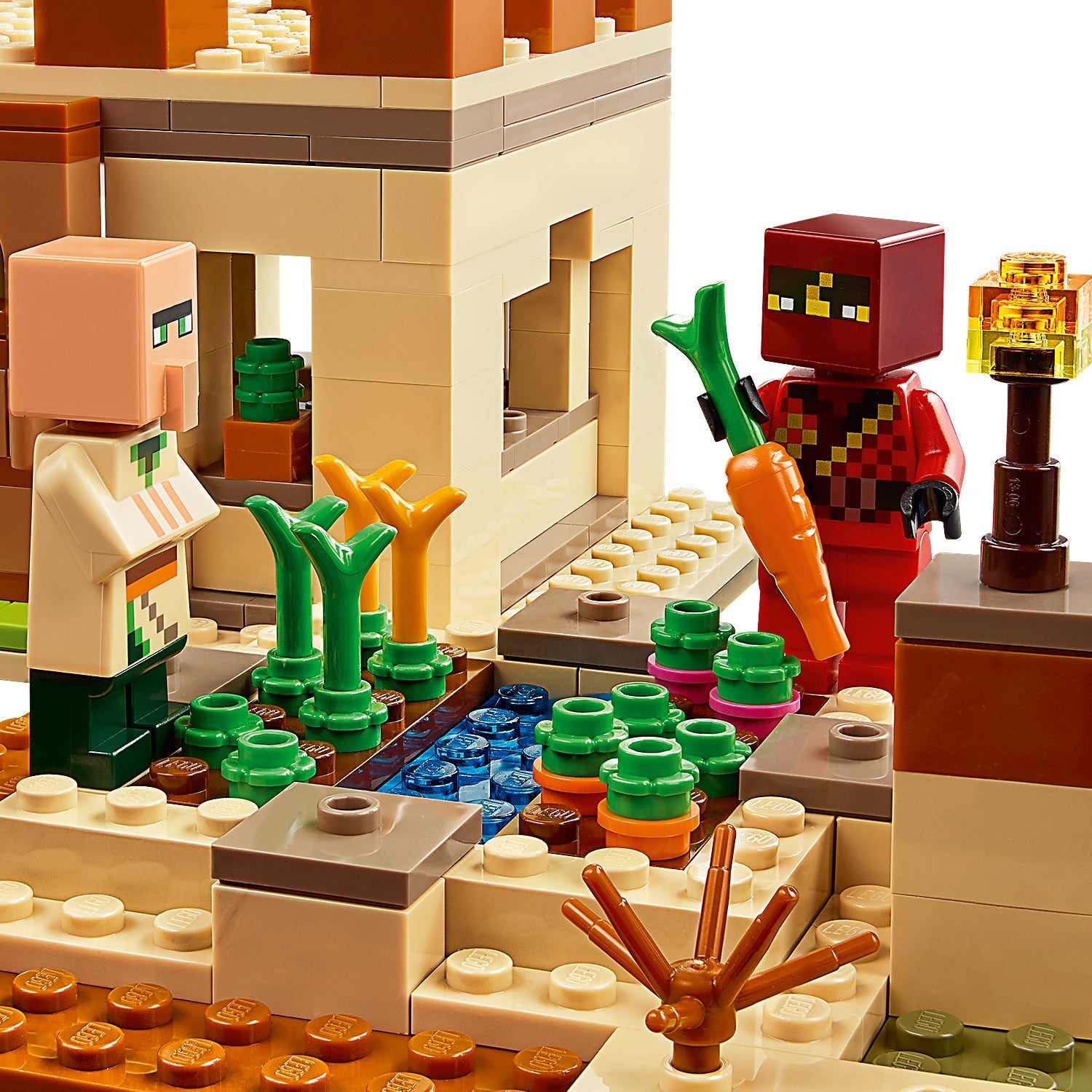 LEGO Minecraft The Illager Raid set features villagers and a Ravager in a detailed village scene with crops.