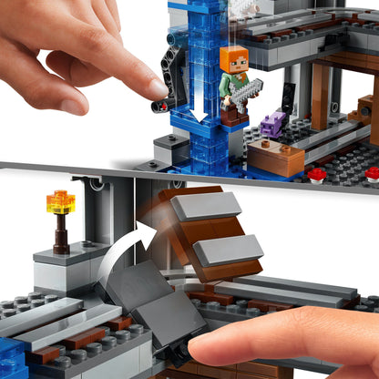 Person interacting with LEGO® Minecraft The First Adventure Set 21169, showcasing features and characters.