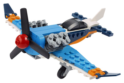 LEGO® Creator 3in1 Propeller Plane Set 31099 in blue, white, and orange, featuring a detailed propeller and cockpit.