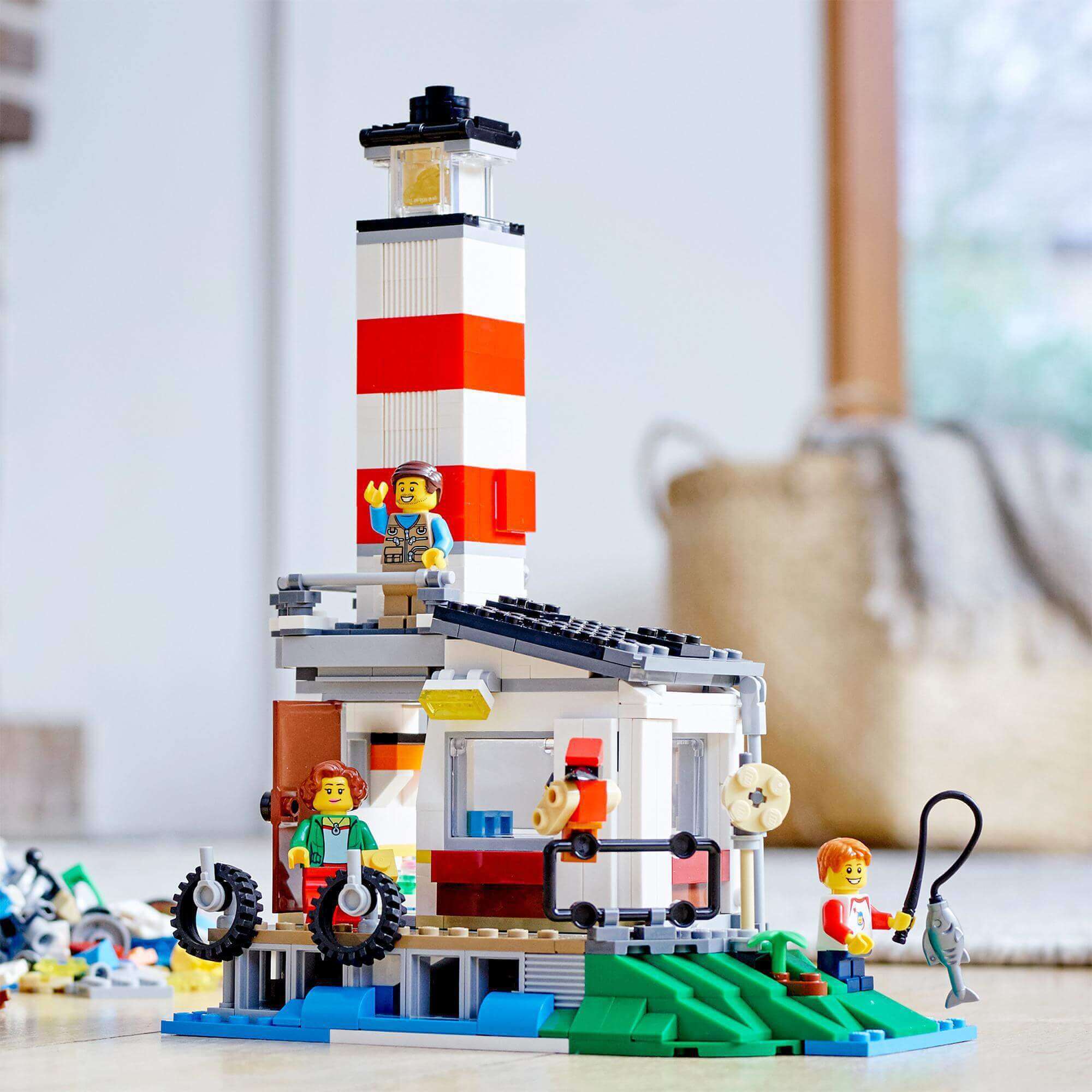 LEGO Creator 3in1 lighthouse set with family figures, perfect for imaginative camping adventures and creative play.