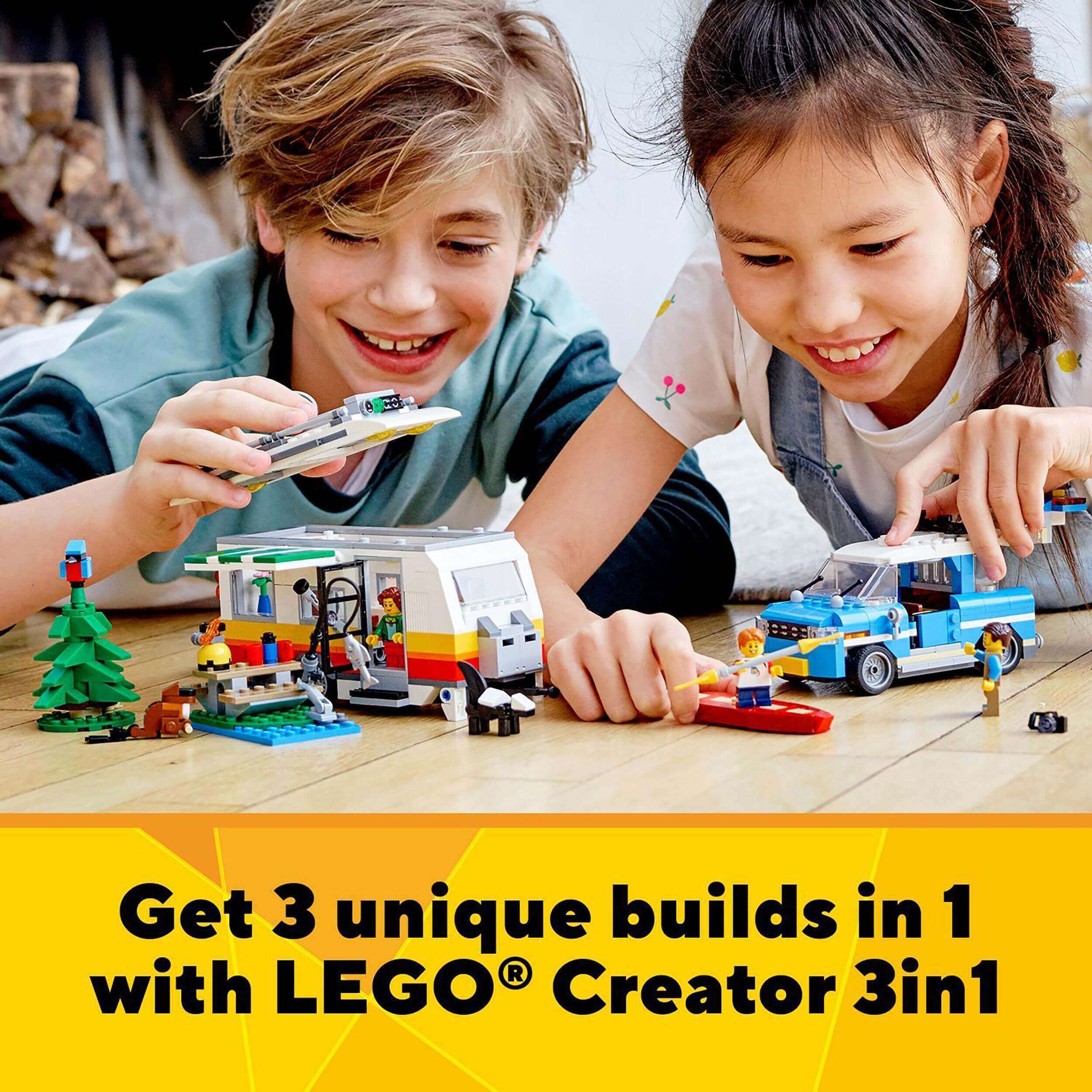 Kids enjoying the LEGO® Creator 3in1 Caravan Family Holiday set, showcasing three build options in playful scene.