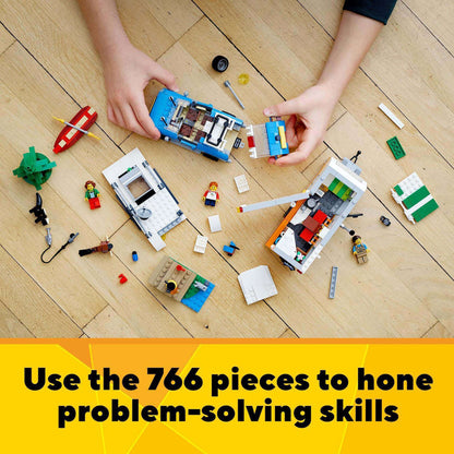 Children using LEGO Creator 3in1 Caravan Family Holiday set to enhance problem-solving skills with 766 colorful pieces.