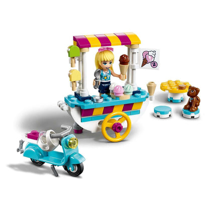 LEGO® Friends Ice Cream Cart Set 41389 featuring ice cream stand, girl, scooter, and cute bear, perfect for imaginative play.