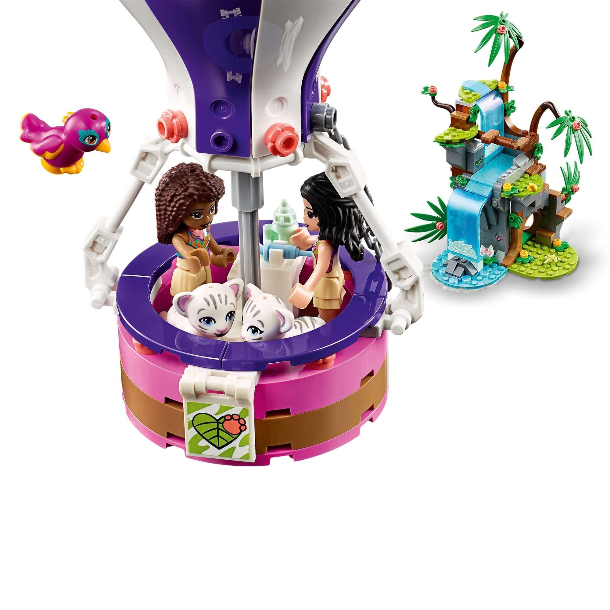 Girls enjoying a balloon ride in the LEGO® Friends Tiger Balloon Jungle Rescue Set 41423, surrounded by wildlife.