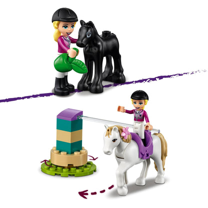 LEGO® Friends Horse Training set 41441 featuring a girl and two horses for creative roleplay and building fun.