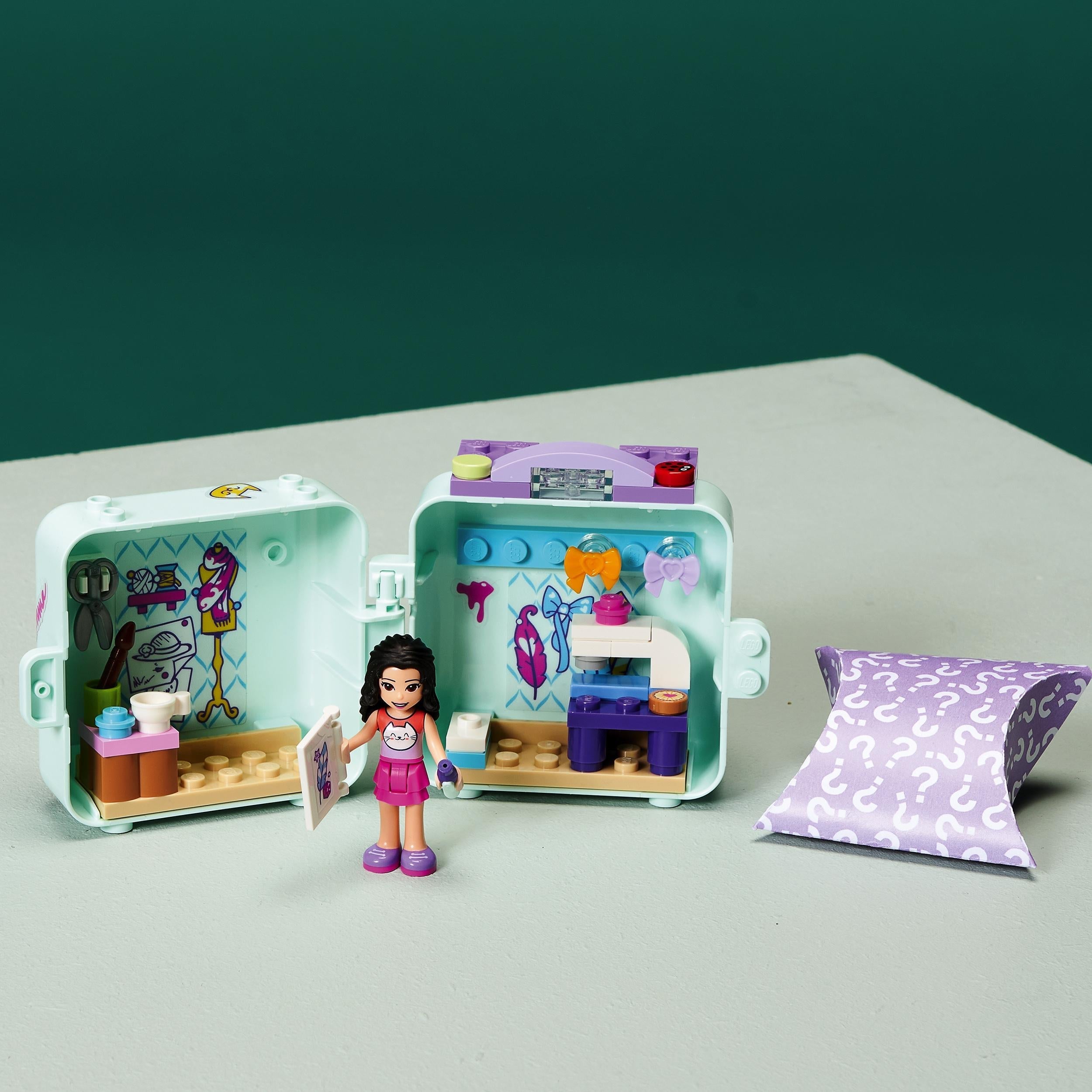 LEGO® Friends Emma’s Fashion Cube Play Set 41668 with mini doll and sewing accessories for creative play.