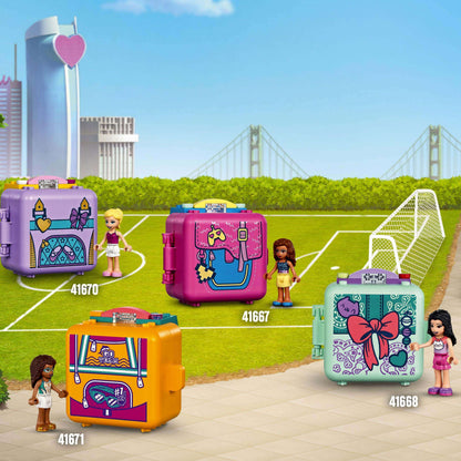 LEGO® Friends soccer cubes showcasing colorful portable playsets for kids on a grass field with soccer goal.