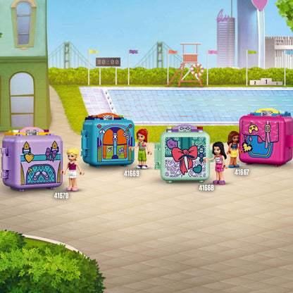LEGO Friends Andrea's Swimming Cube playset and other travel toys at a vibrant swimming pool scene.