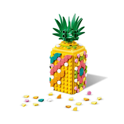 LEGO® DOTS Pineapple Pencil Holder 41906, colorful design with scattered tiles for creative crafting fun.
