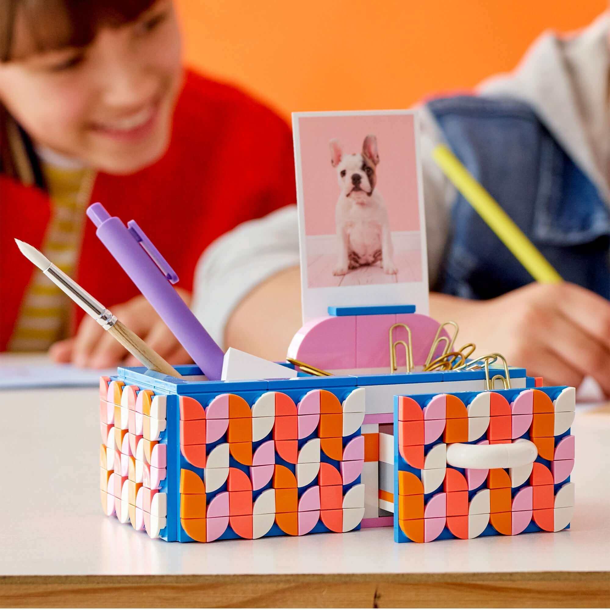 Colorful DOTS Desk Organiser by LEGO® 41907 with picture holder, small drawer, and arts & crafts supplies.