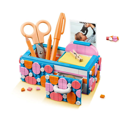 Colorful LEGO® DOTS Desk Organiser with scissors, pens, and a picture holder for arts and crafts enthusiasts.