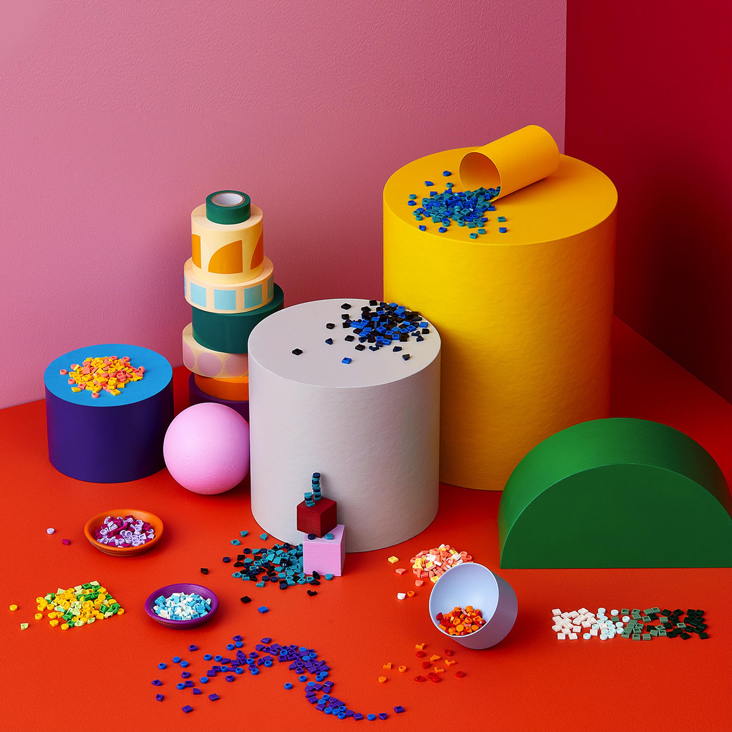 Colorful LEGO DOTS craft set with various shapes and vibrant tiles on display for creative design fun.
