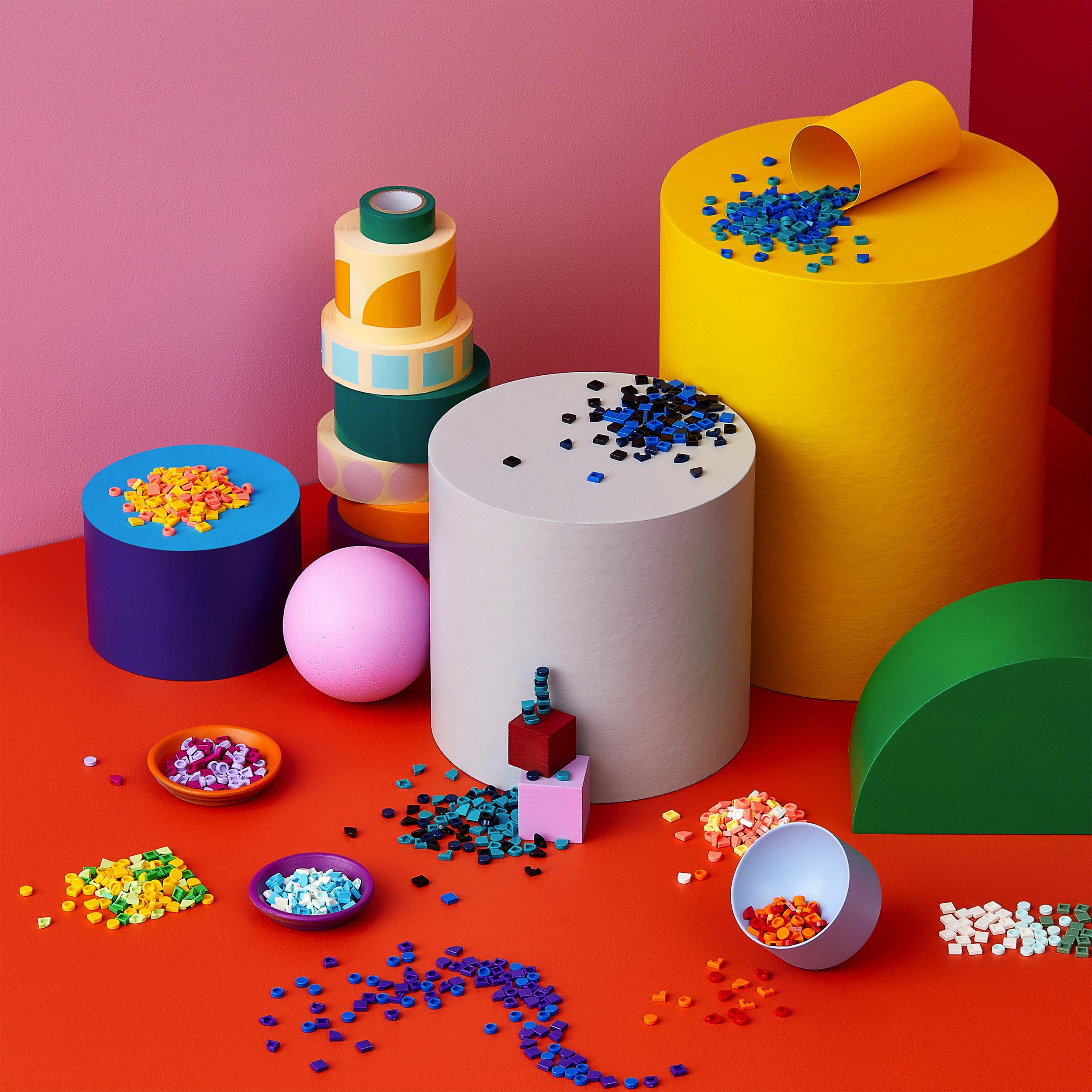 Colorful display of LEGO® DOTS tiles and shapes for creative craft activities, perfect for imaginative play.