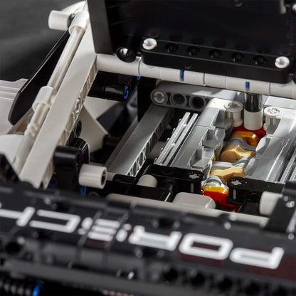 Close-up view of LEGO® Technic Porsche 911 RSR engine, showcasing detailed six-cylinder boxer engine components.