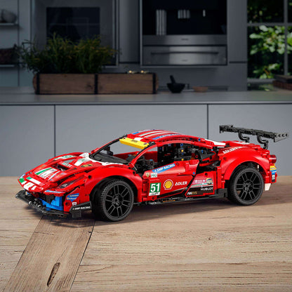 LEGO Technic Ferrari 488 GTE AF Corse #51 model 42125 displayed on a countertop, showcasing its intricate design and vibrant colors.