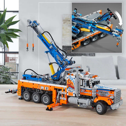 LEGO® Technic Heavy-Duty Tow Truck Toy 42128 with realistic design and detailed crane features.