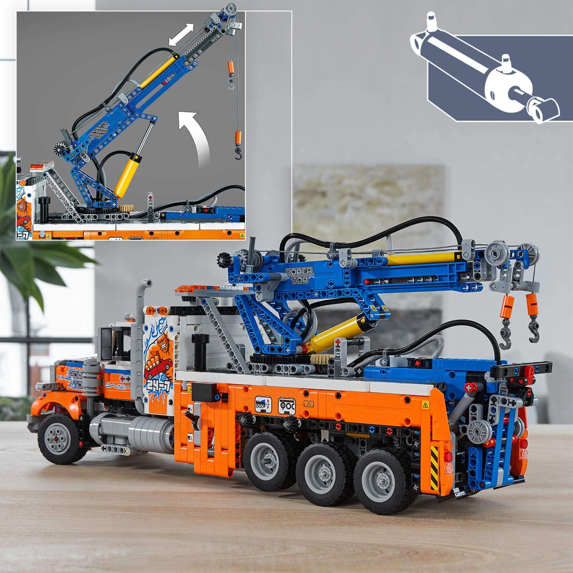LEGO® Technic Heavy-Duty Tow Truck 42128 with realistic moving crane and authentic design details.